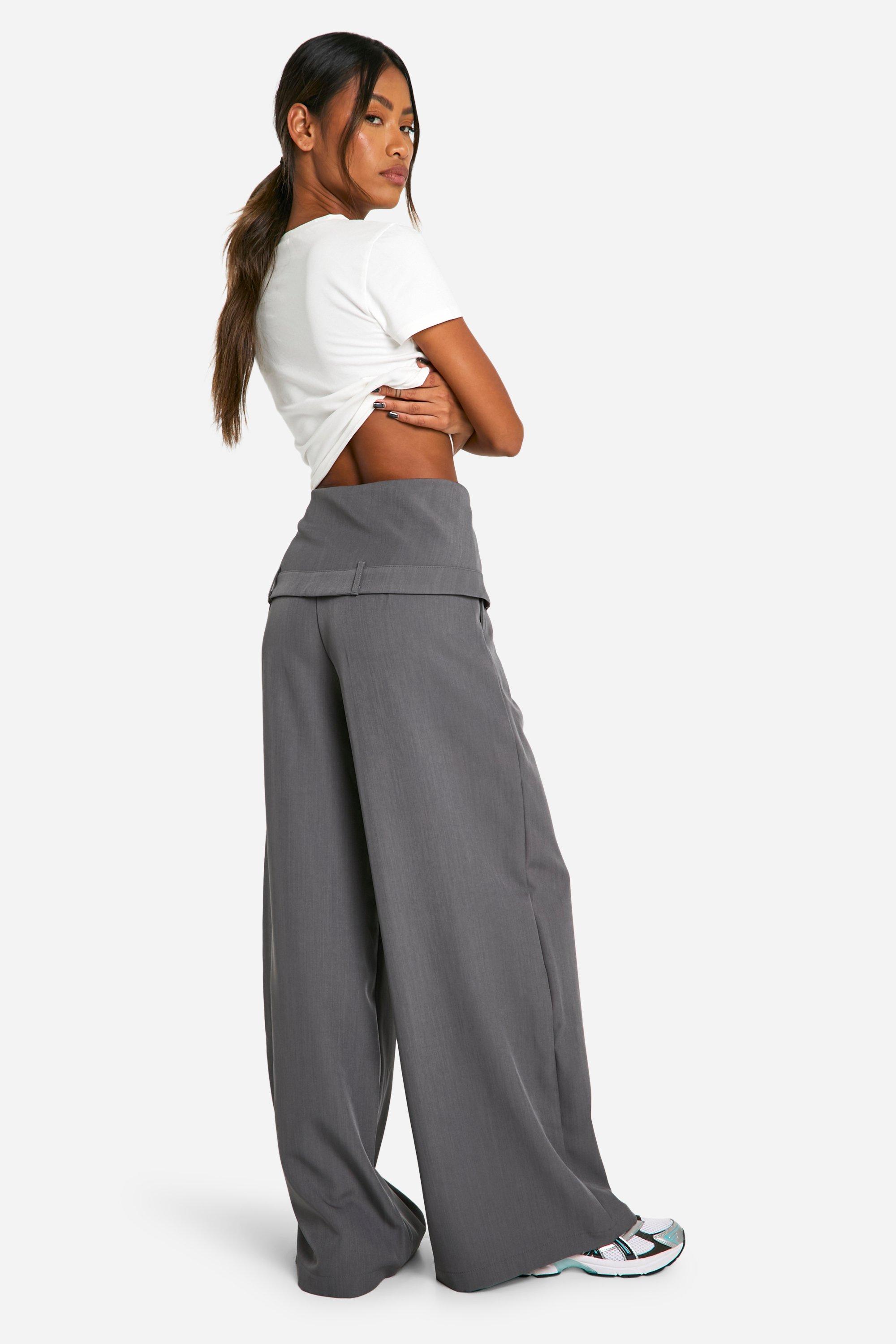 Pantaloni a gamba ampia con parte sovrapposta alla gonna