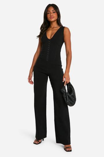 Jumpsuit Met Korset Detail En Metalen Ringetjes black