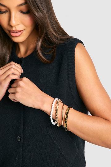 Leopard and Pearl Layered Bangles gold