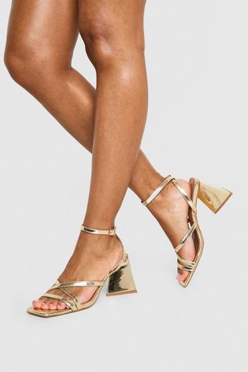 Metallic Flared Heel Crossover Sandals gold