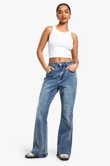 The Petite High Waist Flared Jean vintage wash