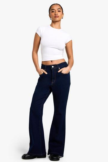 The Petite High Waist Flared Jean indigo