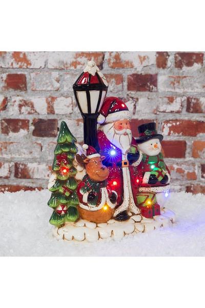 The Novelties Company Multi Light Up LED Christmas Scene with Music