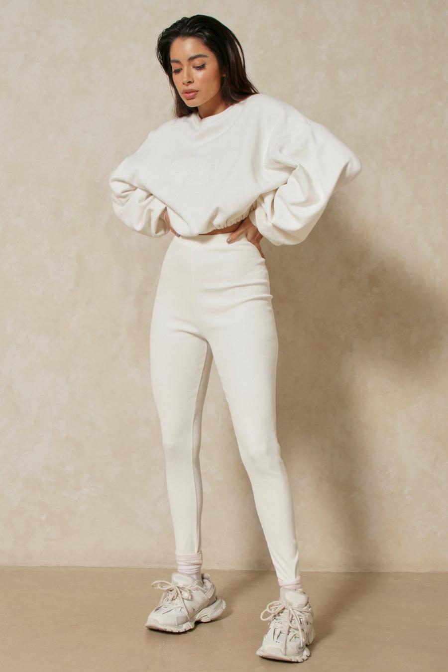https://media.boohoo.com/i/boohoo/mpp03093_cream_xl/female-cream-ribbed-high-waist-ribbed-leggings/?w=900&qlt=default&fmt.jp2.qlt=70&fmt=auto&sm=fit