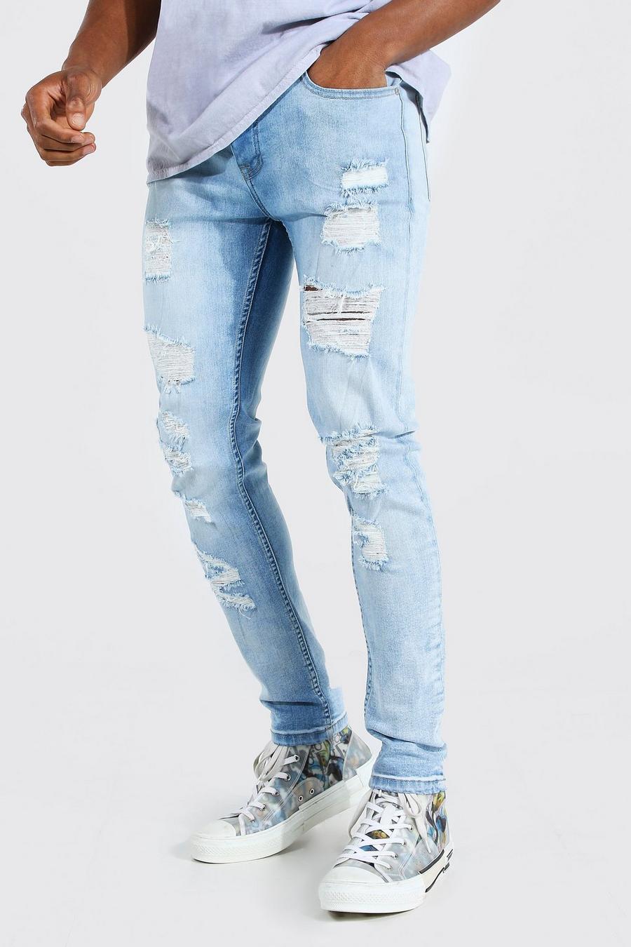 Jeans skinny elasticizzato con strappi all over, Blu ghiaccio image number 1