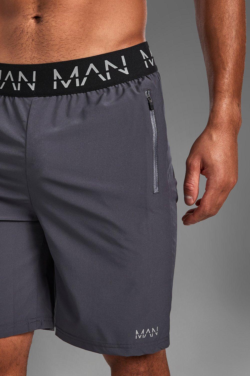 Mens sports shorts with zip outlet pockets