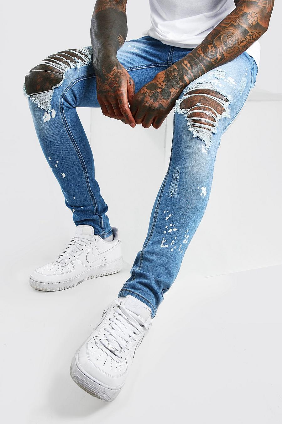 כחול חיוור סופר סקיני ג'ינס עם קרעים וכתמים מולבנים image number 1
