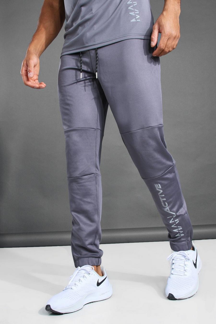 פחם מכנסי ריצה ספורטיביים עם עיטור תפרים גזרת קרסול צרה וכיתוב MAN image number 1
