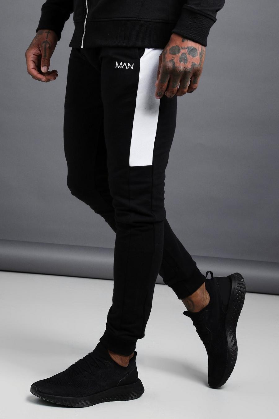 Pantalones de deporte Skinny con paneles laterales MAN Active, Negro image number 1