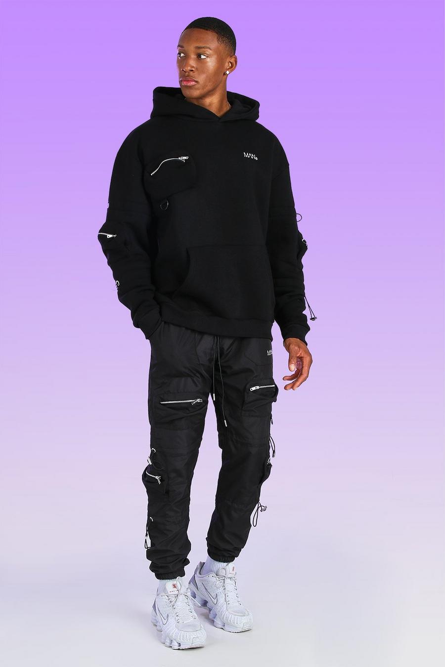 Black Oversized Man Cargo Hoodie With Bungee Cord image number 1