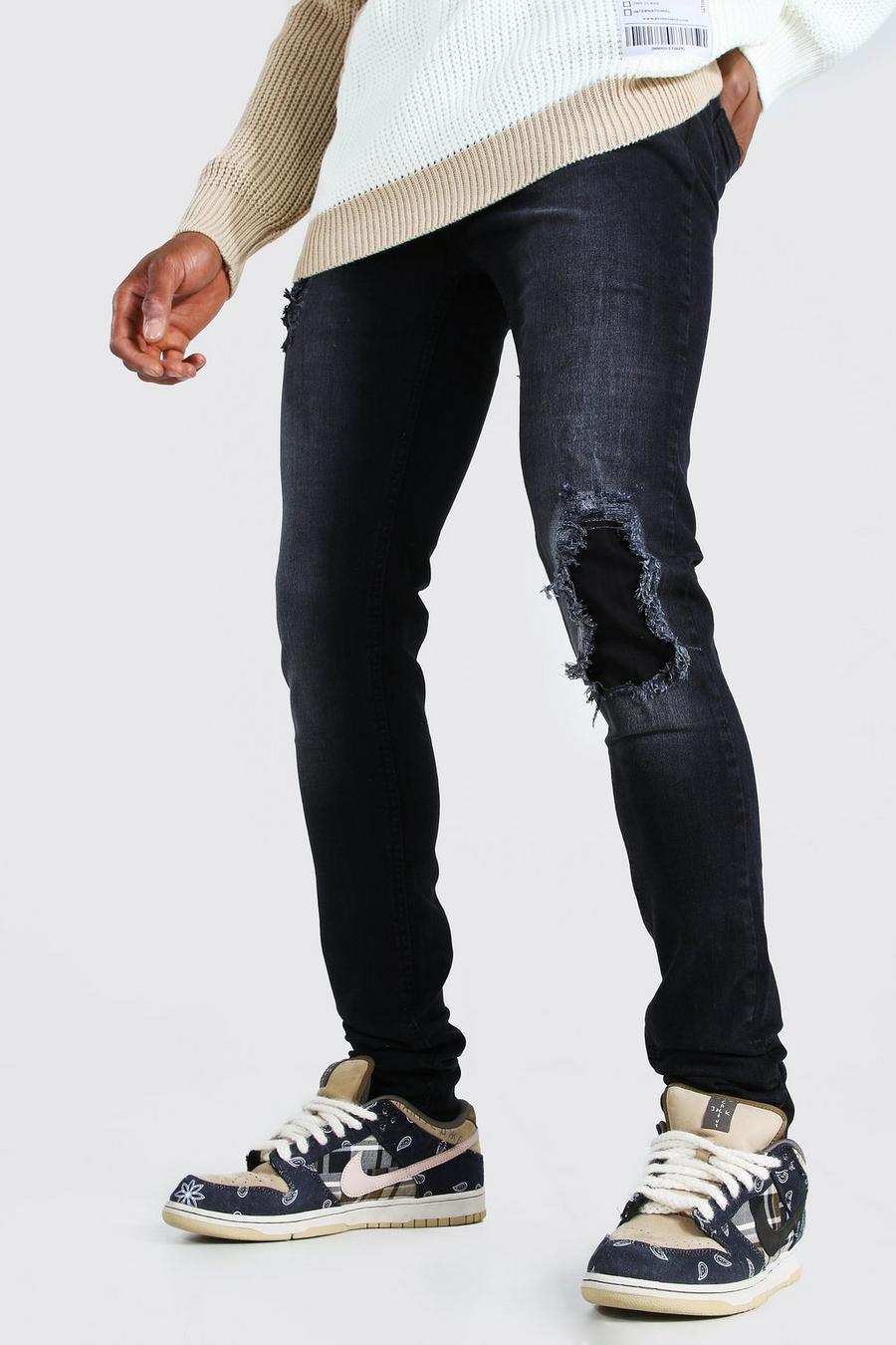 שחור דהוי סקיני ג'ינס בסגנון קרע וטלאי בברך עם קרעים גדולים image number 1