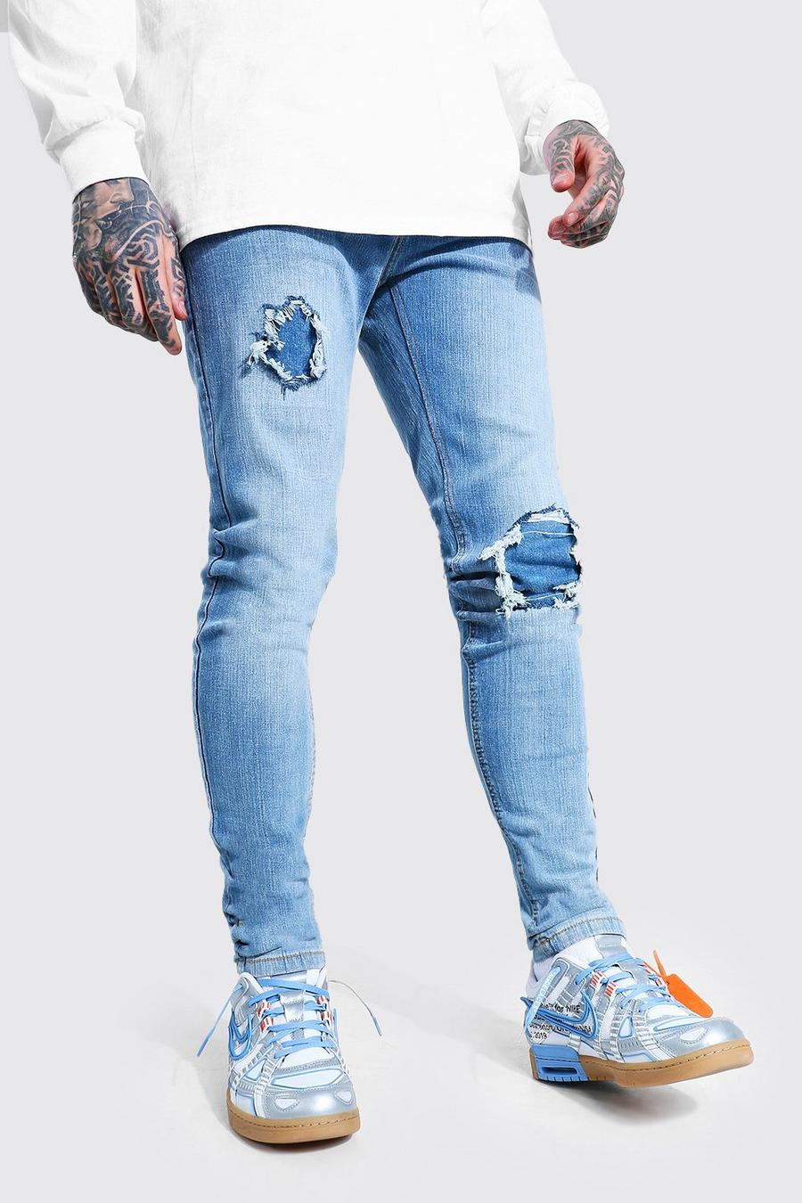 Mid blue Skinny jeans med slitna knän och lagningar image number 1