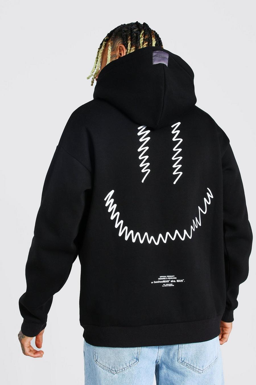 Black Oversized MAN Official Drip Face Back Print Hoodie image number 1