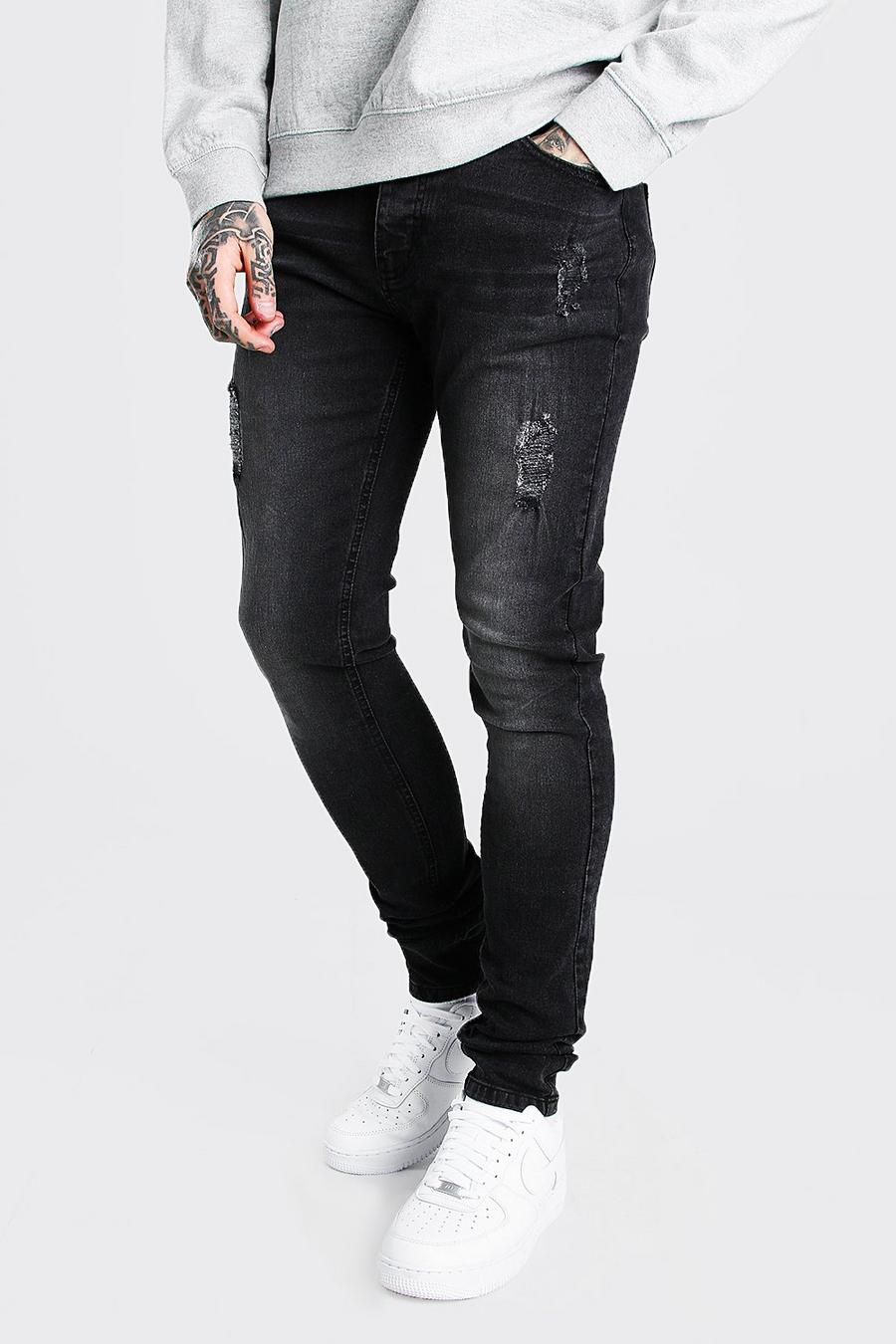Washed black Skinny jeans med stretch och slitage image number 1