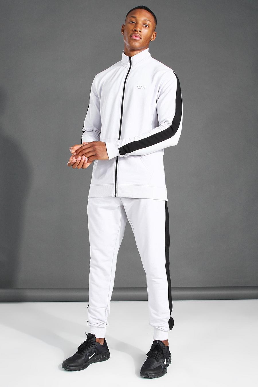 אפר חליפת טרנינג ספורטיבית עם רוכסן, צווארון משפך, פס בצד וכיתוב MAN image number 1