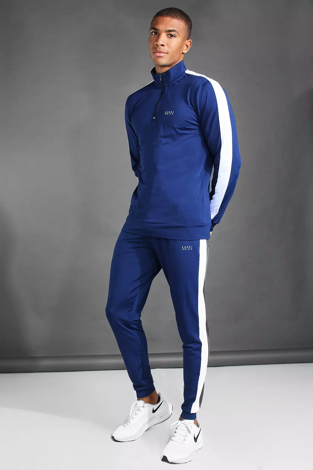 Tracksuit with store stripe down side