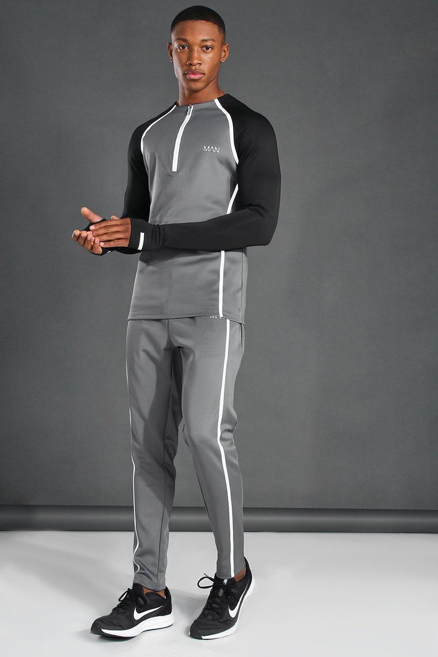 Grey MAN Active Träningsoverall i muscle fit med reflexdetaljer image number 1