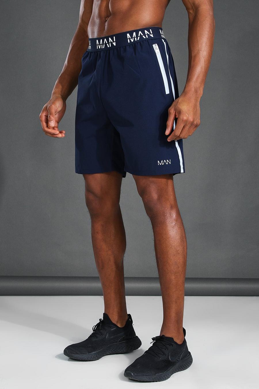 Reflektierende Active Shorts mit „MAN“-Print, Marineblau image number 1