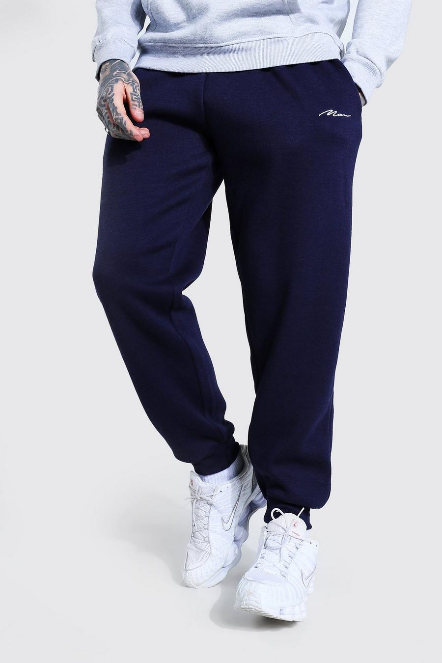 Pantalones de deporte holgados de marca MAN, Azul marino image number 1