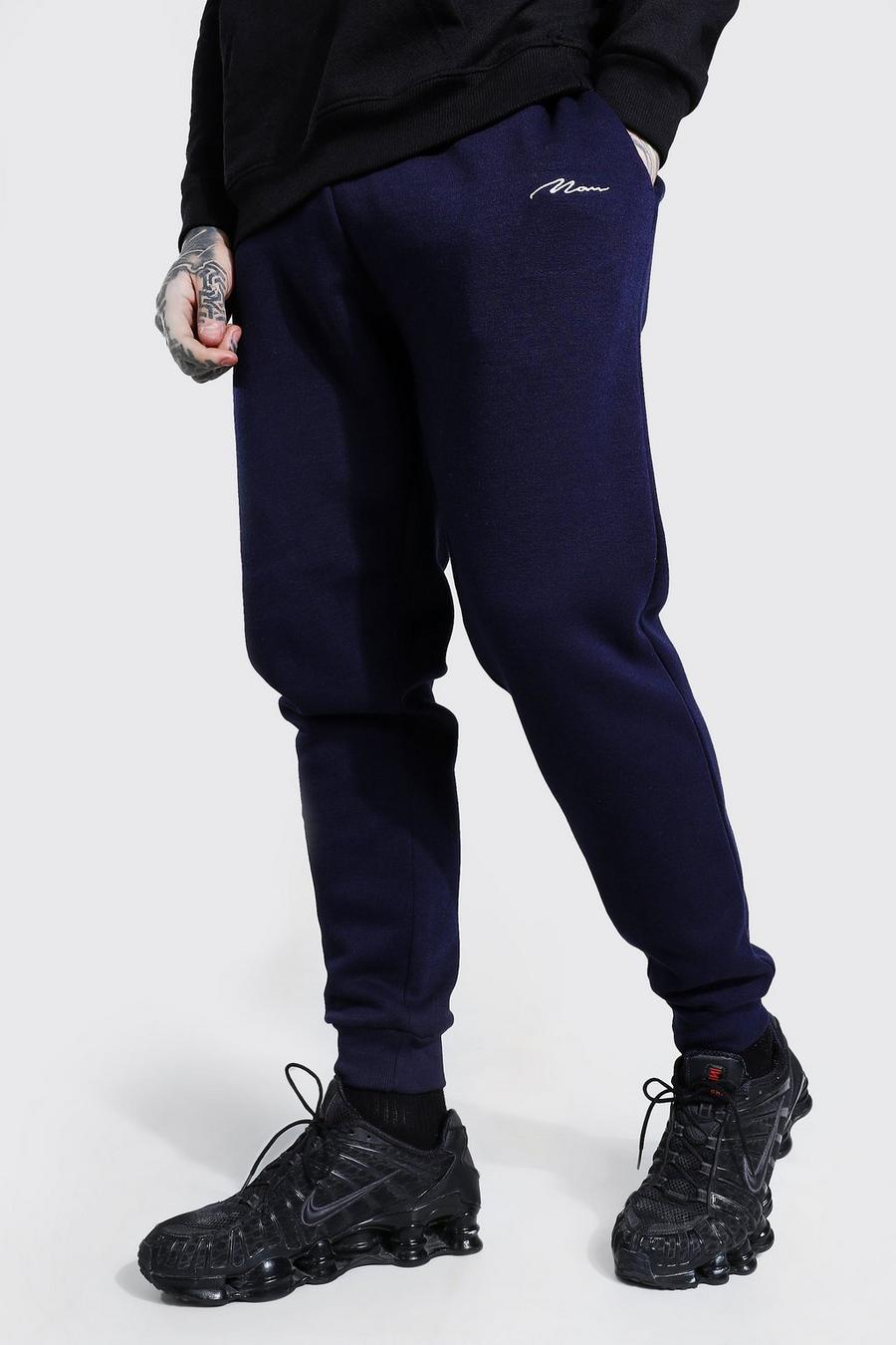 Pantaloni jogging slim fit con scritta MAN, Blu oltremare image number 1