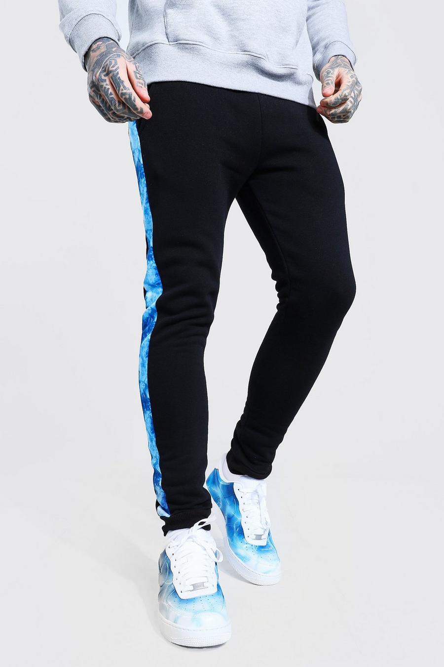 Blue Joggers i skinny fit med batikmönstrade paneler image number 1