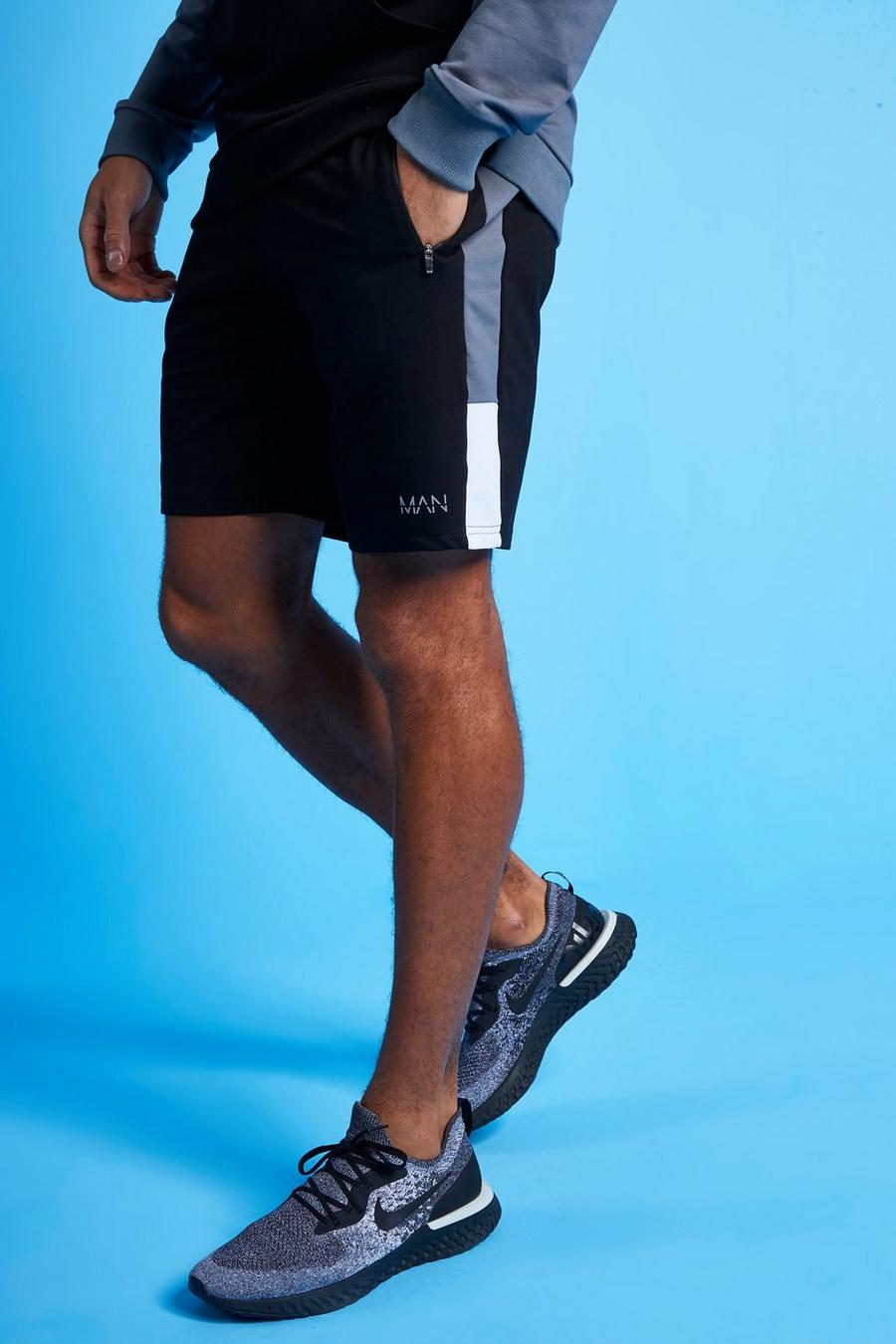 Charcoal Man Active Gestreepte Colour Block Shorts image number 1