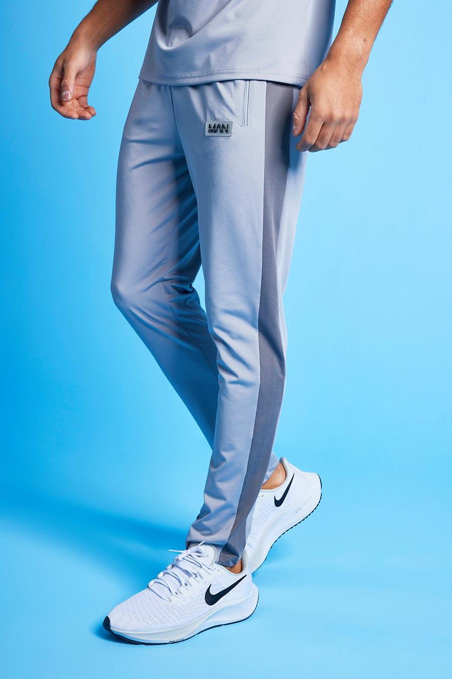 אפור מכנסי ריצה ספורטיביים קולור בלוק Man image number 1