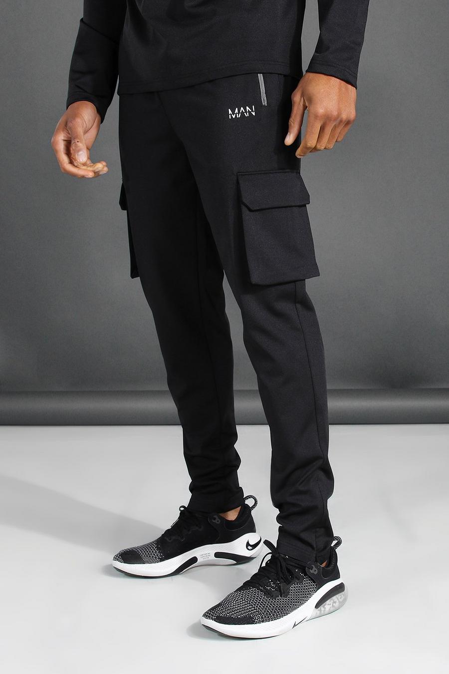 Pantalones de deporte con bolsillo de camuflaje deportivo Man, Negro image number 1