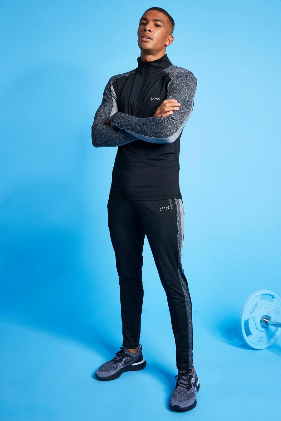 שחור חליפת טרנינג ספורטיבית בשני צבעים עם 1/4 רוכסן של Man image number 1