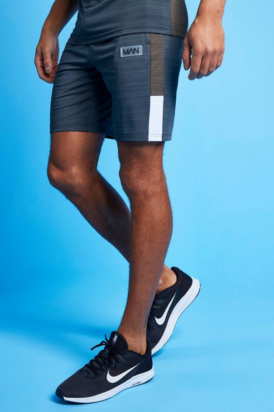 Olive MAN Active Melerade shorts med blockfärger image number 1