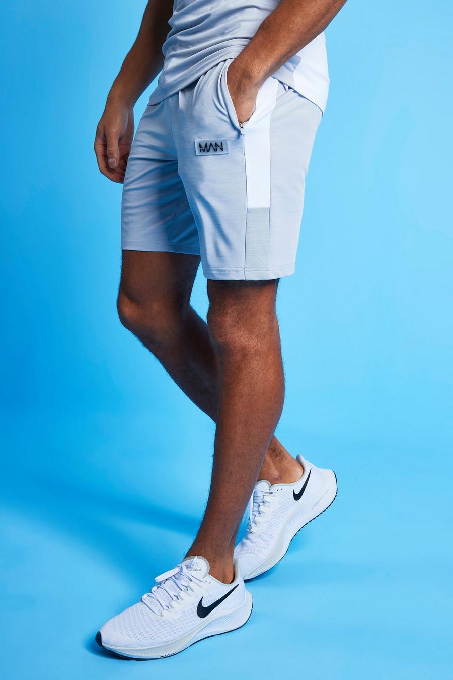 Pantalones cortos deportivos de marga con bloques de color Man, Blanco image number 1