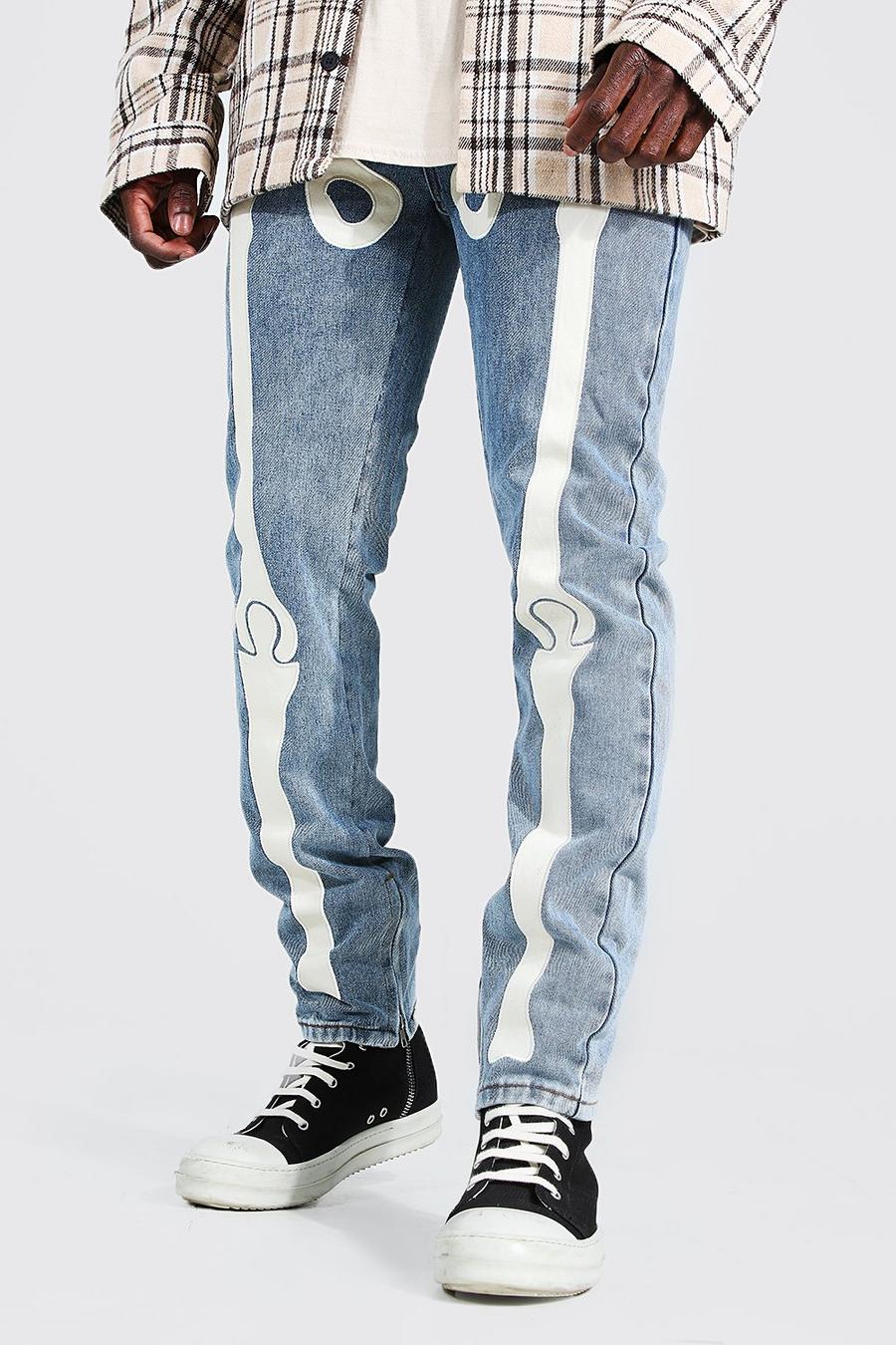 Ice blue Skinny jeans i rigid denim med skelettapplikation image number 1
