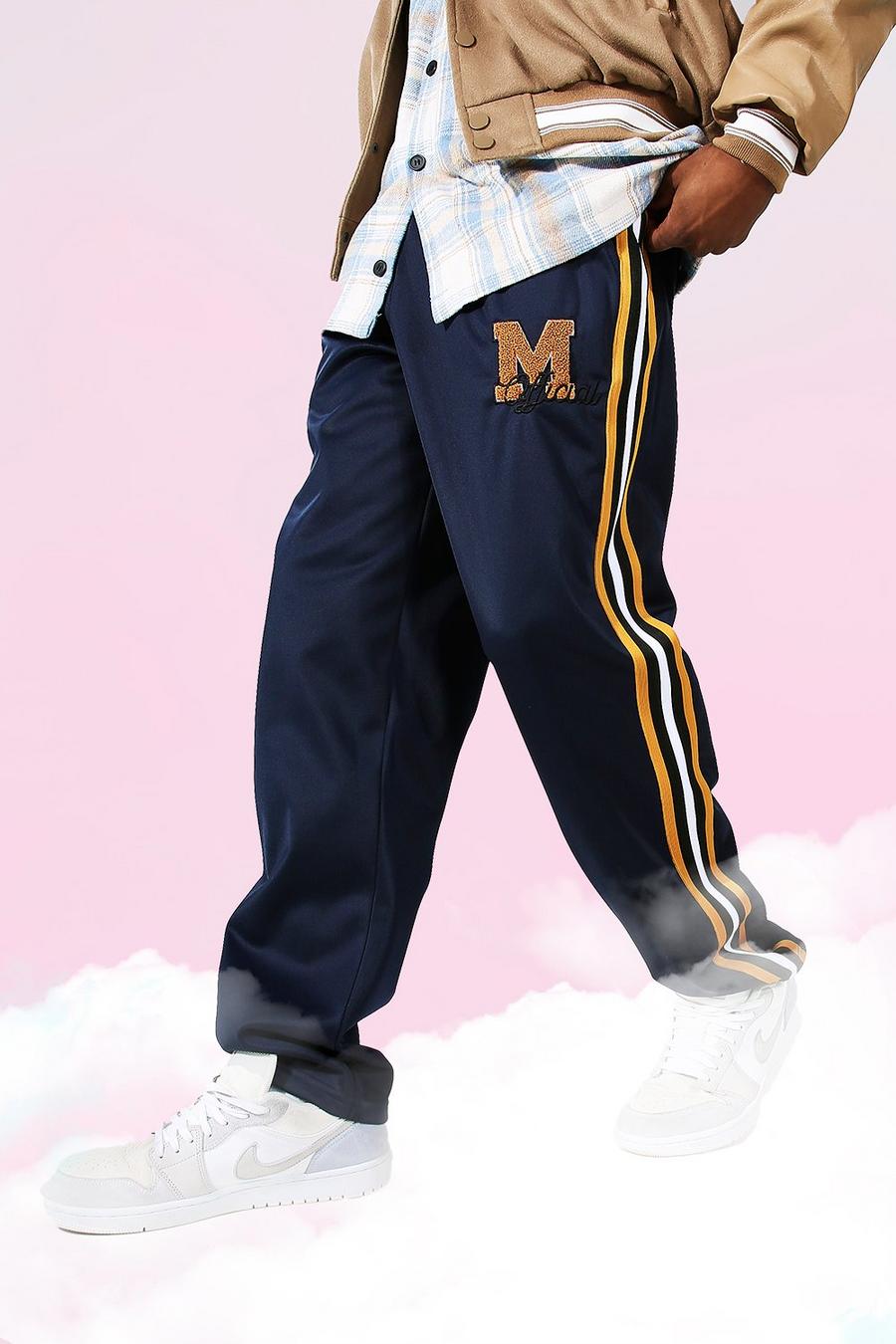 Pantaloni tuta taglio rilassato in tricot con righe laterali Official, Blu oltremare image number 1