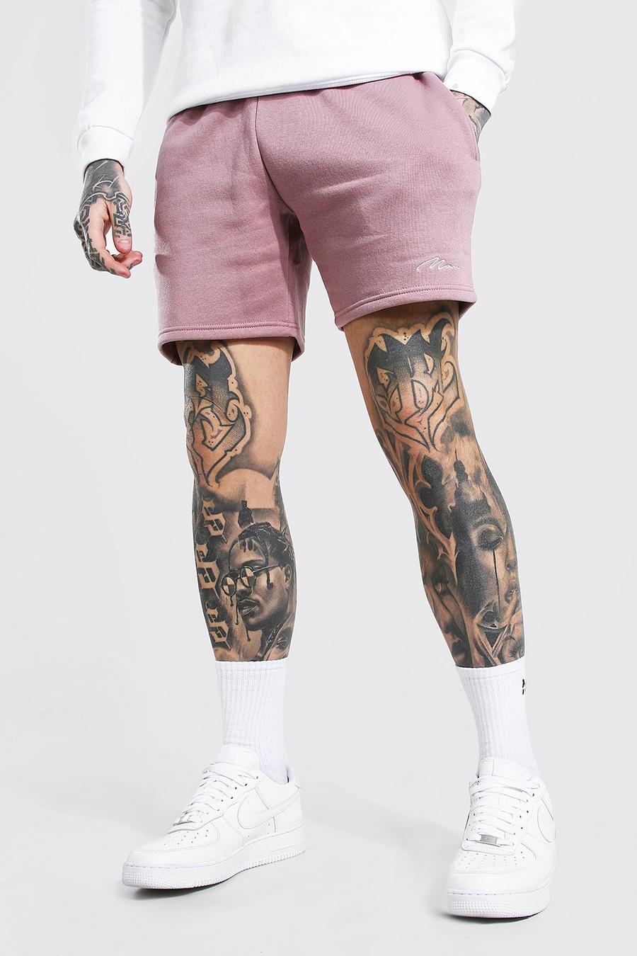 Pantalones cortos de punto ajustados con firma Man, Malva image number 1