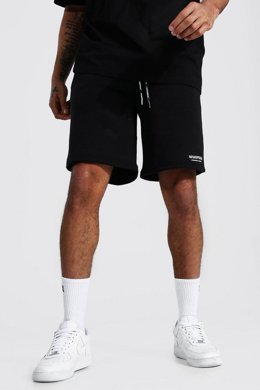 Black Man Official Baggy Middellange Shorts Met Taille Band Detail image number 1