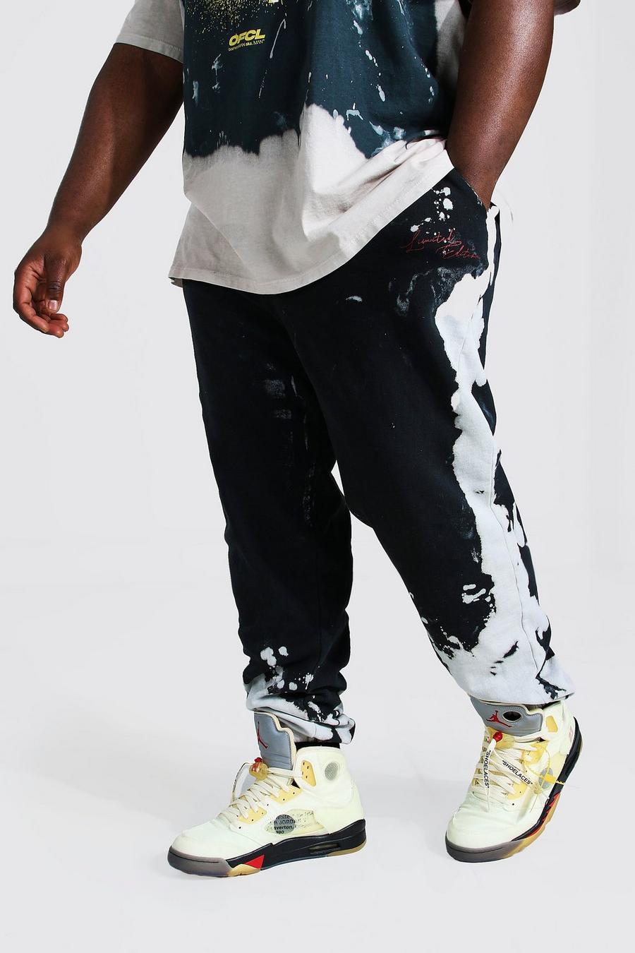 שחור מכנסי ריצה טאי-דאי עם הדפס פרצוף נוזל Tour למידות גדולות image number 1