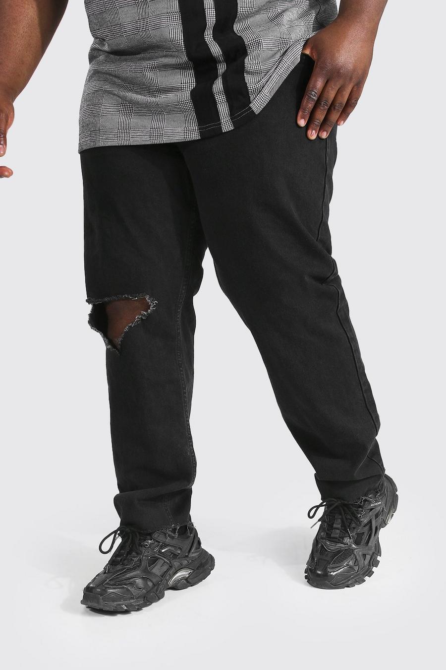 שחור ג'ינס בגזרה צרה עם קרע גדול בברך למידות גדולות image number 1