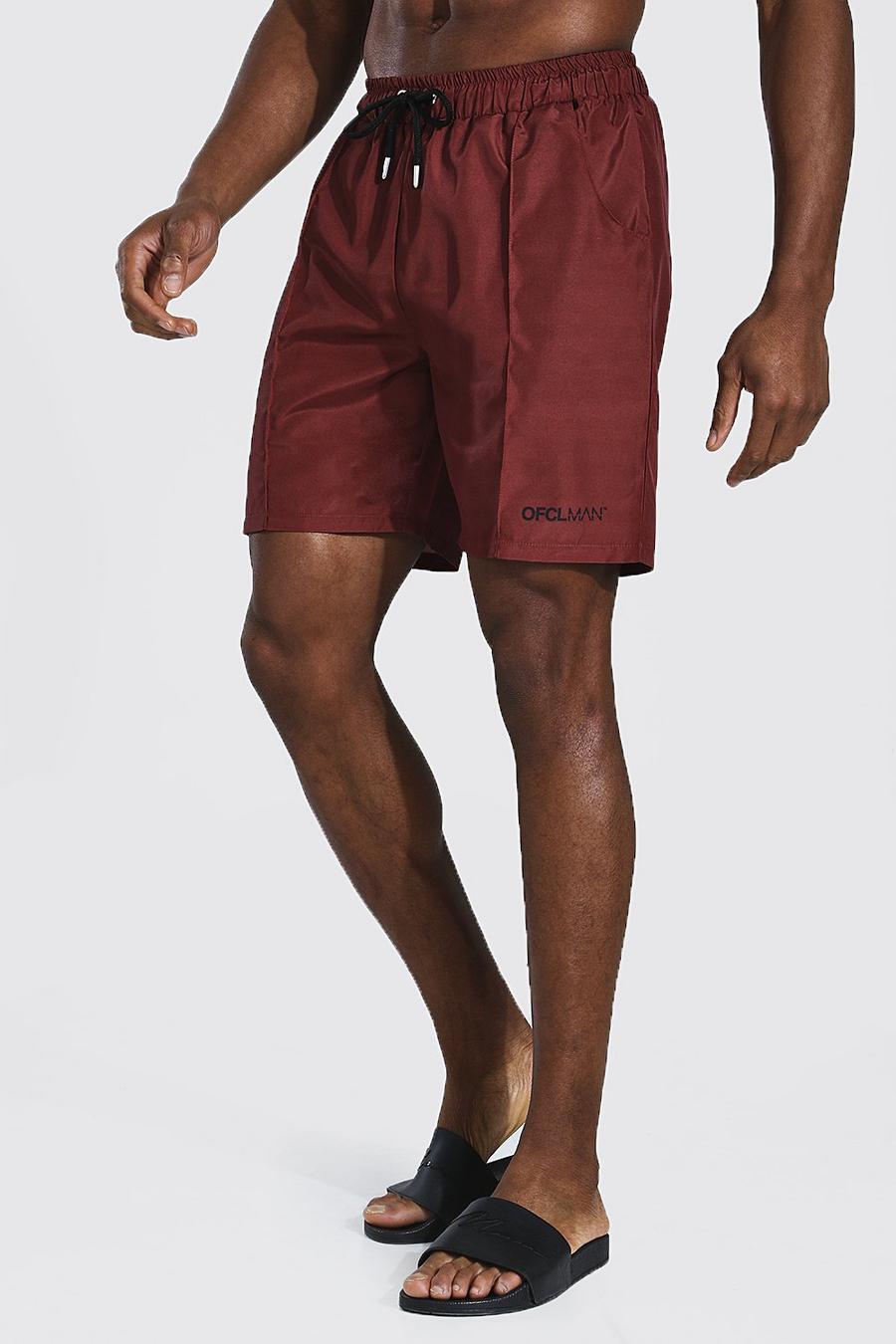 Choc brown Official MAN Mellanlånga badshorts med veck image number 1