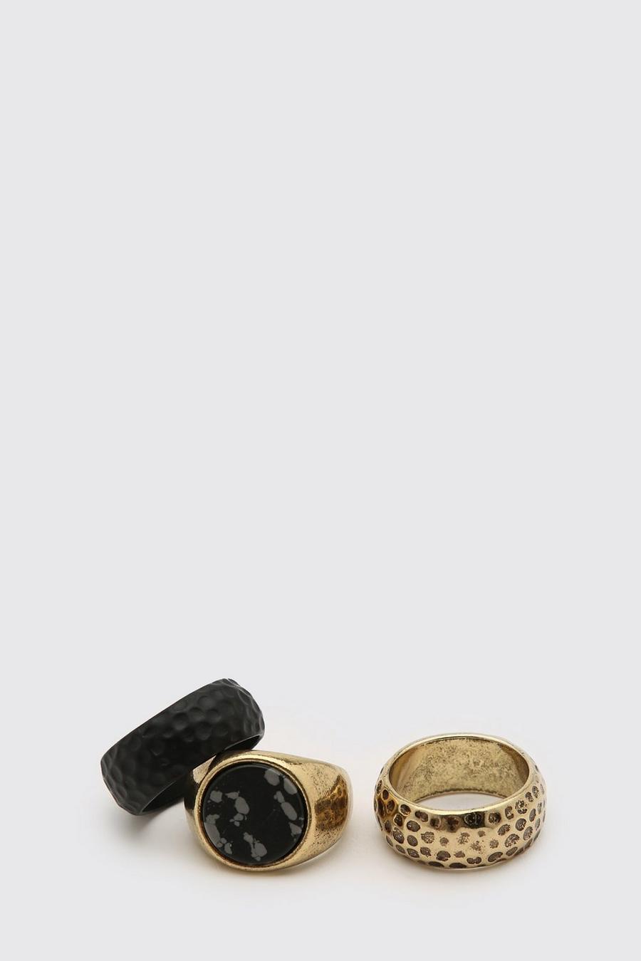Set con 3 anelli testurizzati dorati e neri, Oro image number 1