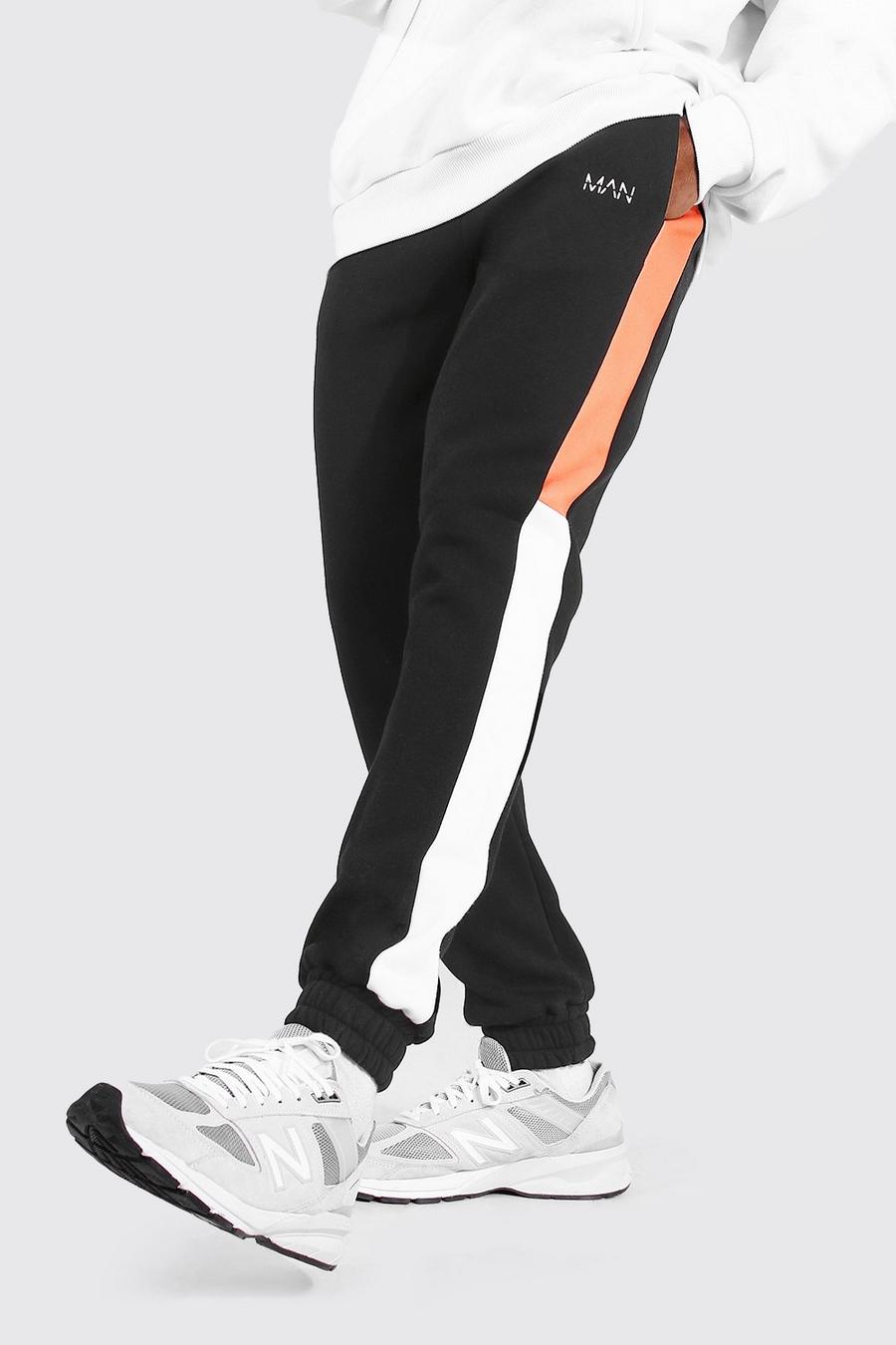 Original MAN Skinny Fit Jogginghose im Colorblock-Design, Orange image number 1