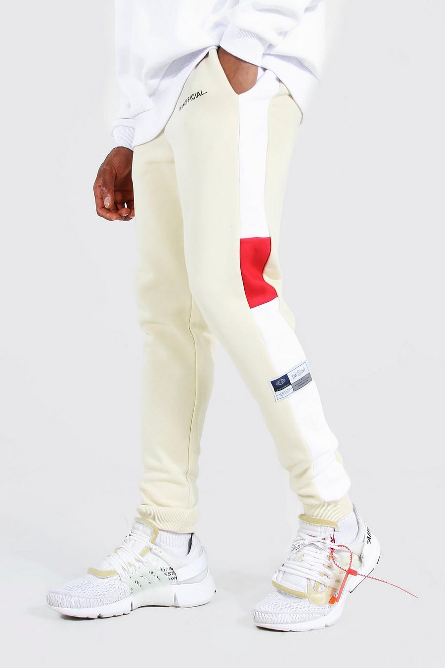 קאמל מכנסי ריצה בגזרת סקיני קולור בלוק עם כיתוב Man Official image number 1