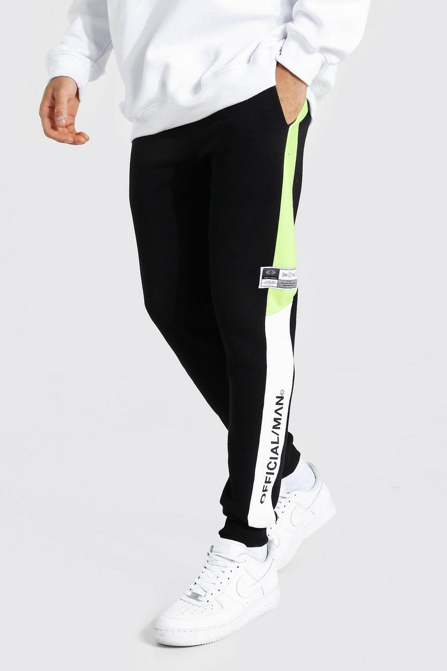 צבע ליים בוהק מכנסי ריצה סקיני קולור בלוק עם כיתוב Official Man image number 1