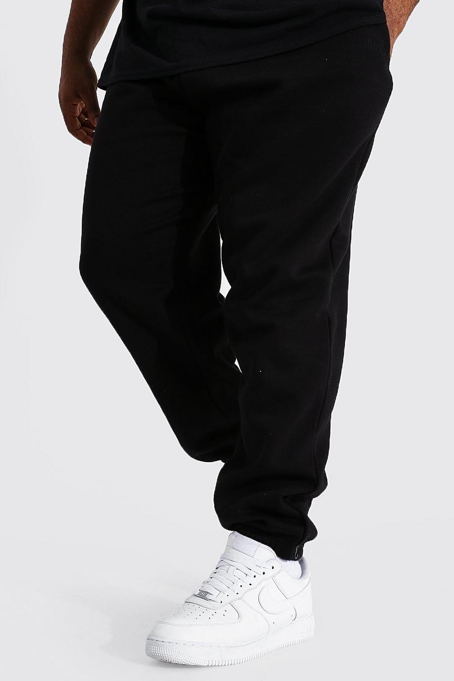 Pantaloni tuta Plus Size taglio rilassato con scritta Man, Nero image number 1