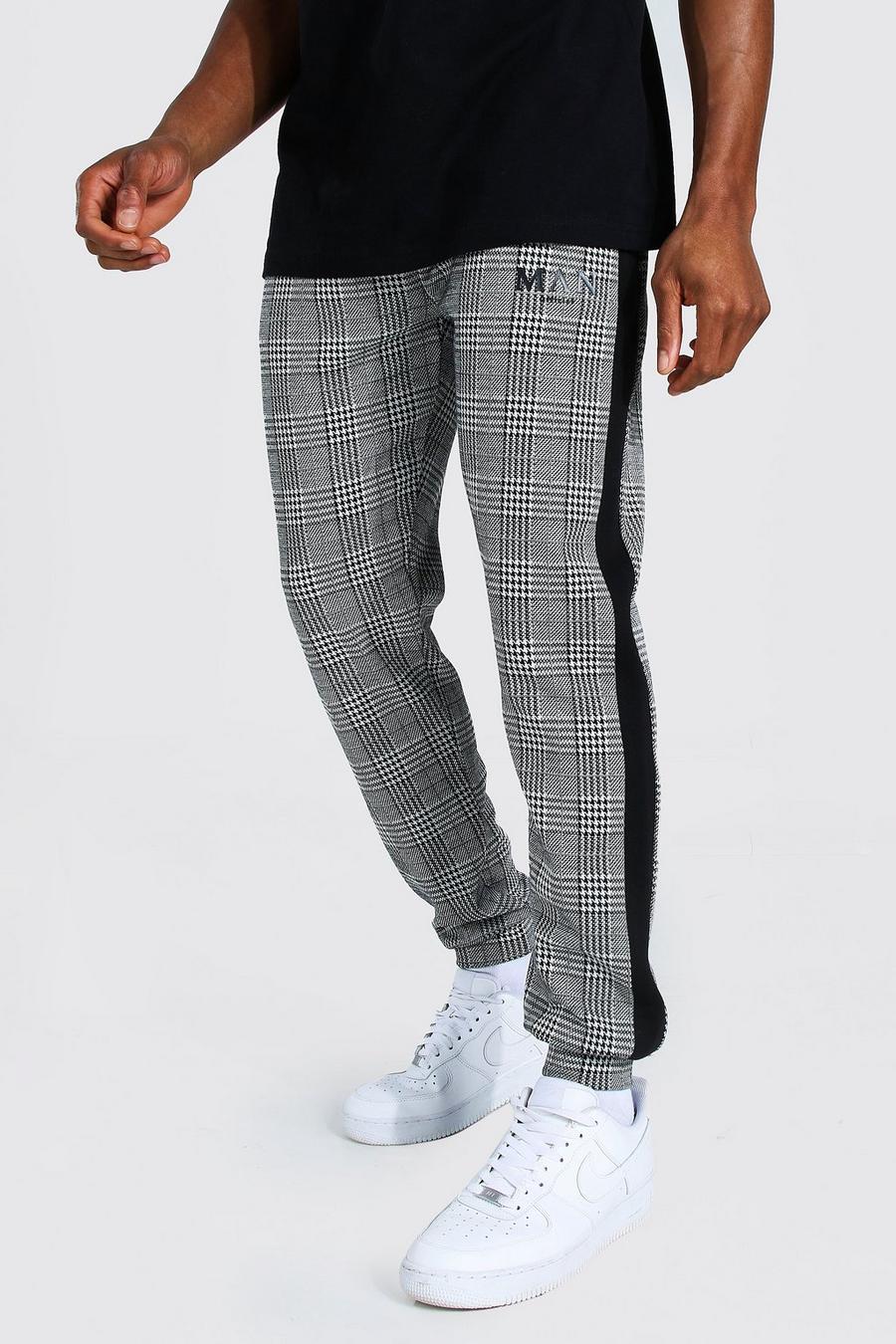 Pantalones de deporte ajustados de jacquard y puño romano Man, Negro image number 1