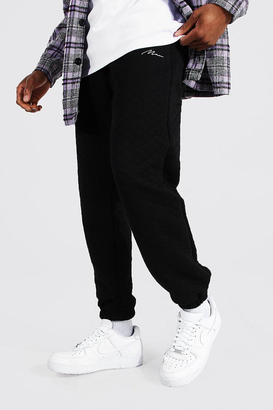 Black Regular Man Signature Quilted Joggers image number 1