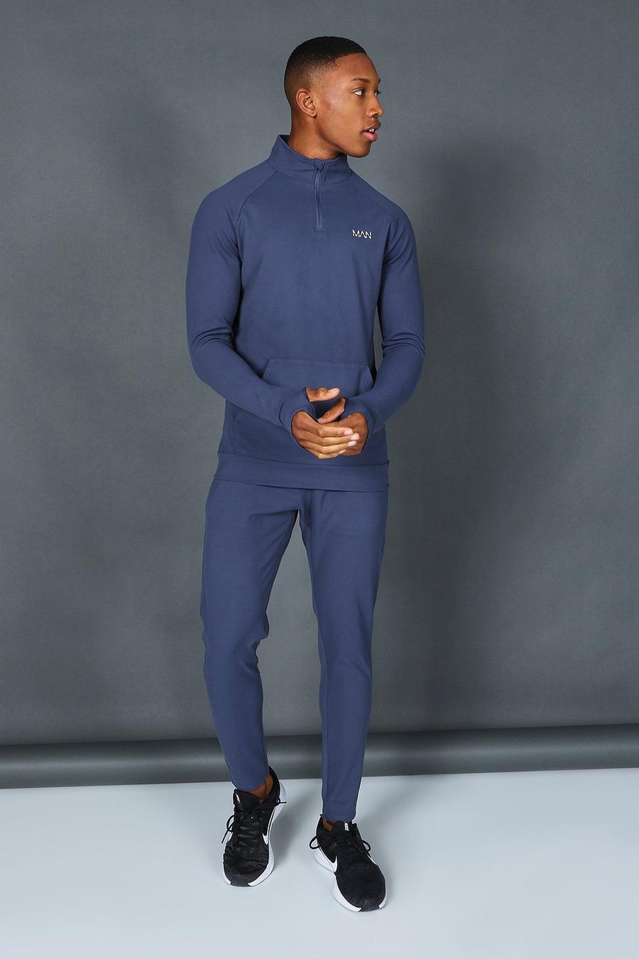 כחול מאובק  חליפת טרנינג ספורטיבית בגזרה צמודה עם רוכסן חלקי וכיתוב Man image number 1
