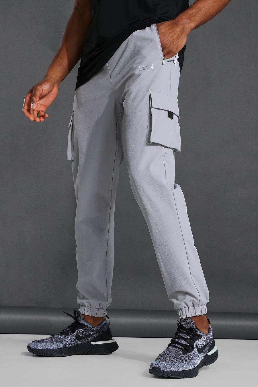 מכנסי ריצה קרגו ספורטיביים בסגנון מקצועי עם כיתוב Man image number 1