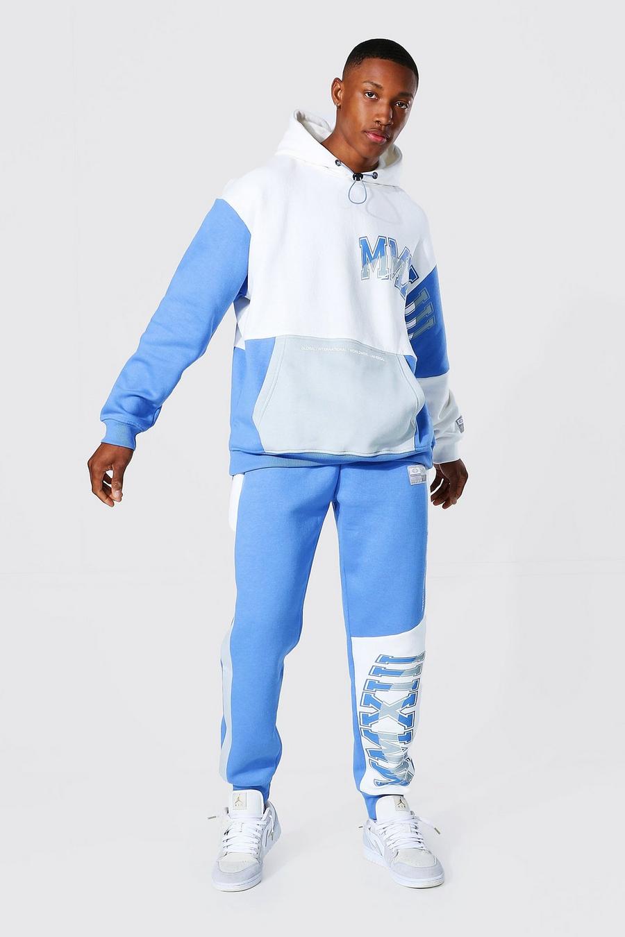 Blue Oversize träningsoverall med hoodie och blockfärger image number 1