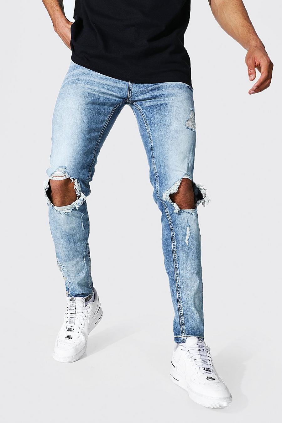 כחול בהיר ג'ינס סקיני נמתח עם קרעים גדולים בברכיים ומכפלת תיקתקים image number 1