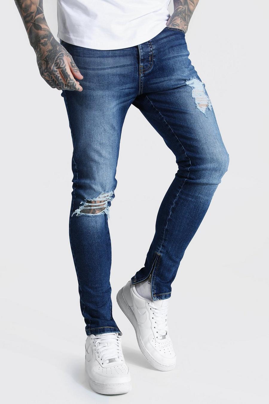 Dark blue Super skinny jeans med slitet knä och dragkedjor image number 1